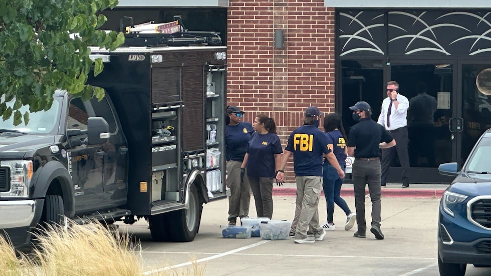Law enforcement responds to the scene of a shooting Tuesday, May 5, 2026, at K Towne Plaza in...