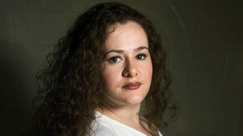 Christa Gail Pike, shown in this July 24, 2002 photo, is already facing execution for the...