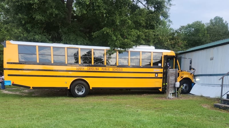 School bus carrying 40+ students crashes into Orangeburg County home
